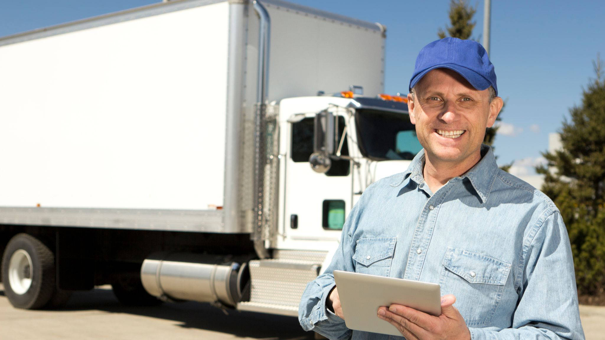 Man standing in front of a truck